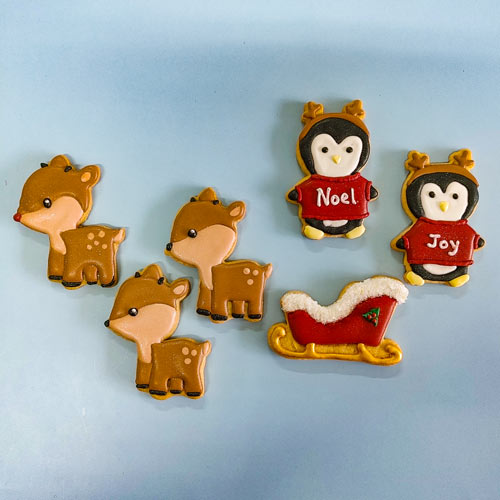 6 piece Sleigh and Penguins Chirstmas cookie Set (can be or dered separately). Three reindeer (one with red nose) a sleigh and two penguins