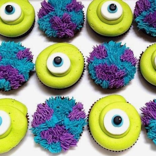 Cupcakes decorated like Monsters Inc's Sully and Mike
